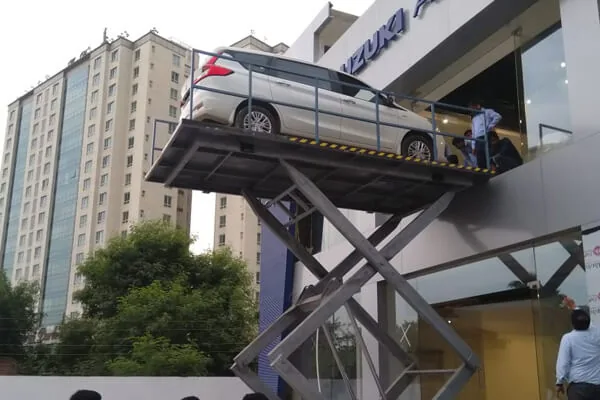 Car lift at full travel during load testing